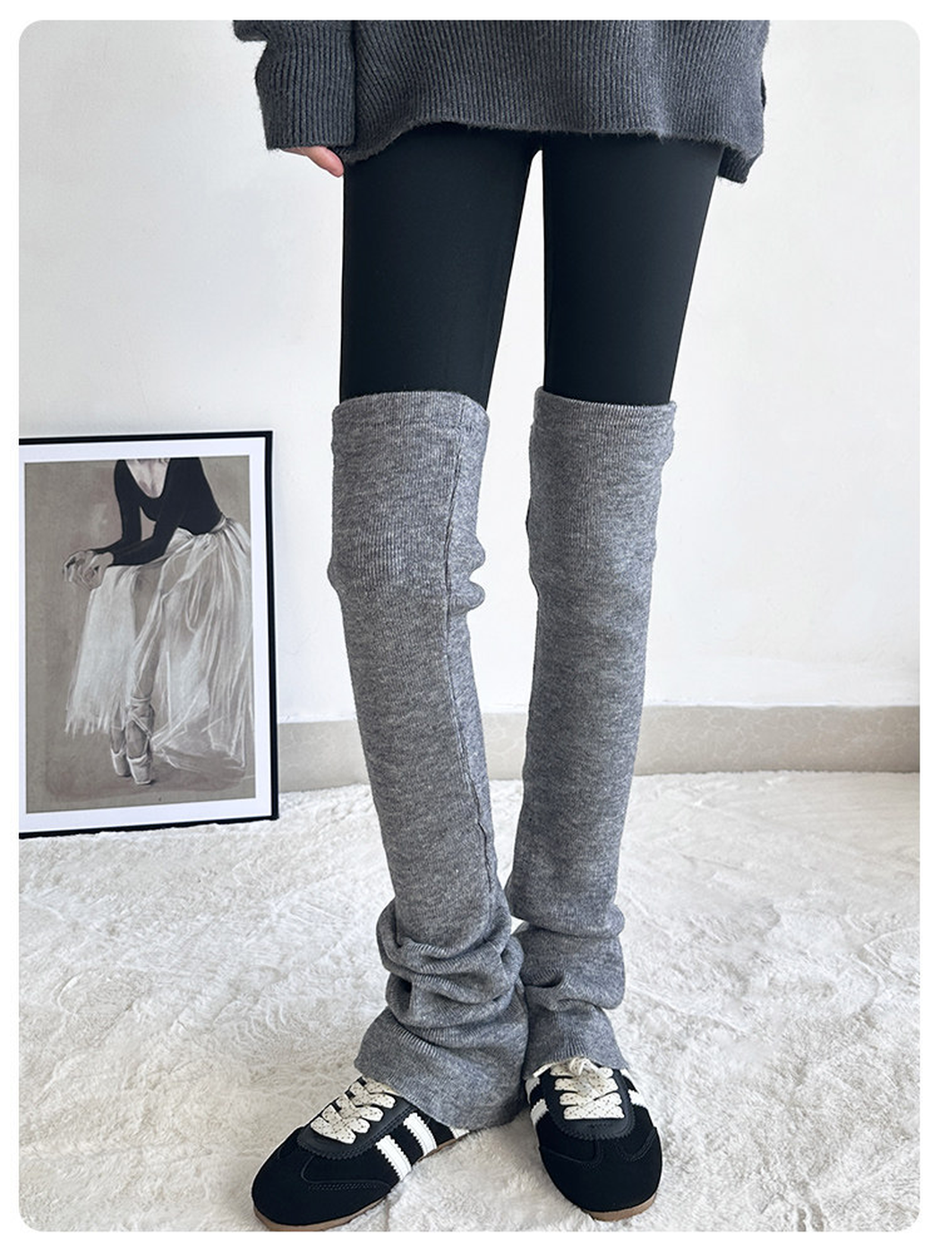 Gray ribbed over-the-knee leg warmers worn with black shoes, front view