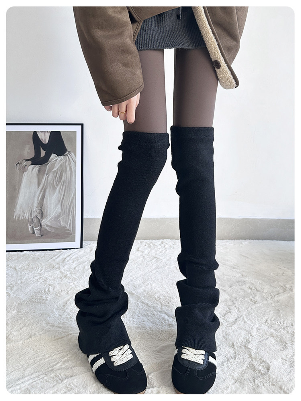 Black ribbed over-the-knee leg warmers worn with black shoes, front view