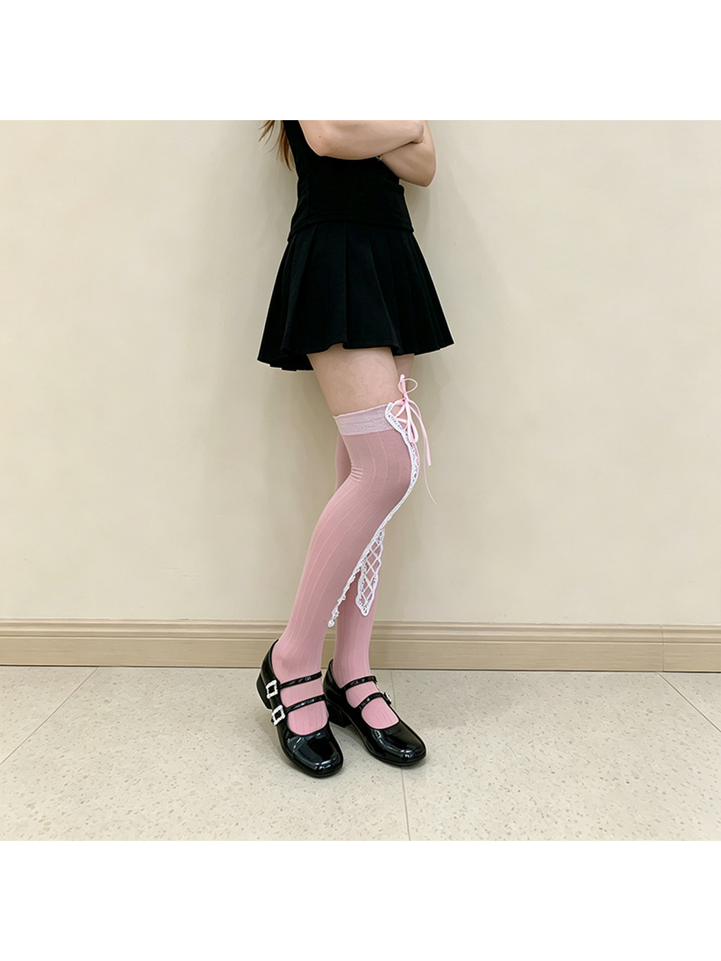 Gray / Pink over-the-knee sock with lace-up trim, worn side view
