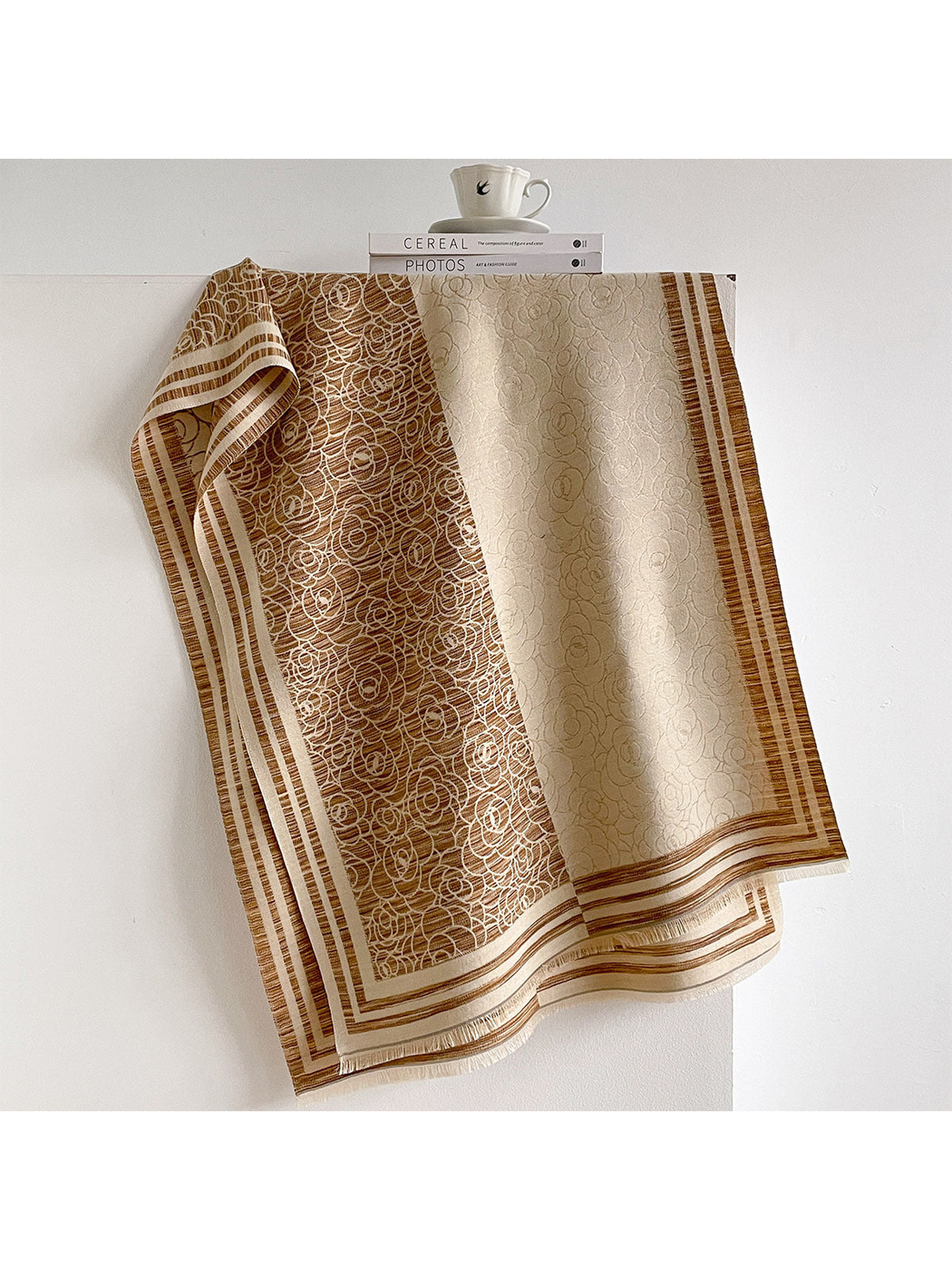 Camel / Cream floral scarf draped to show contrasting panels, striped borders and short fringe.