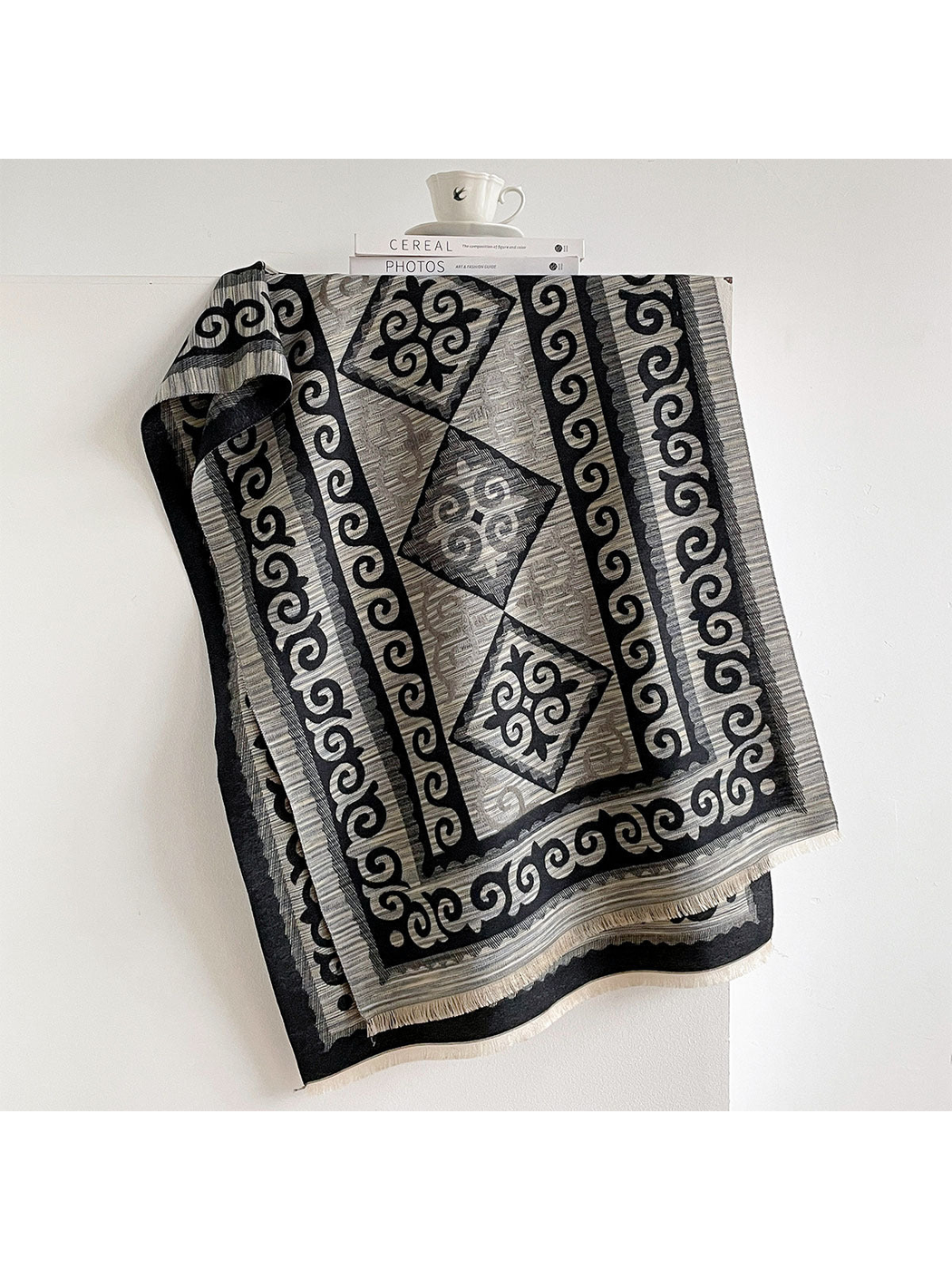 Black / Gray scarf draped open with scroll borders, diamond medallions, and short fringe.