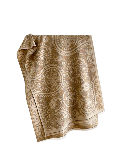 Khaki / Ivory paisley scarf with floral medallions, a contrasting border and short fringe, draped against white.