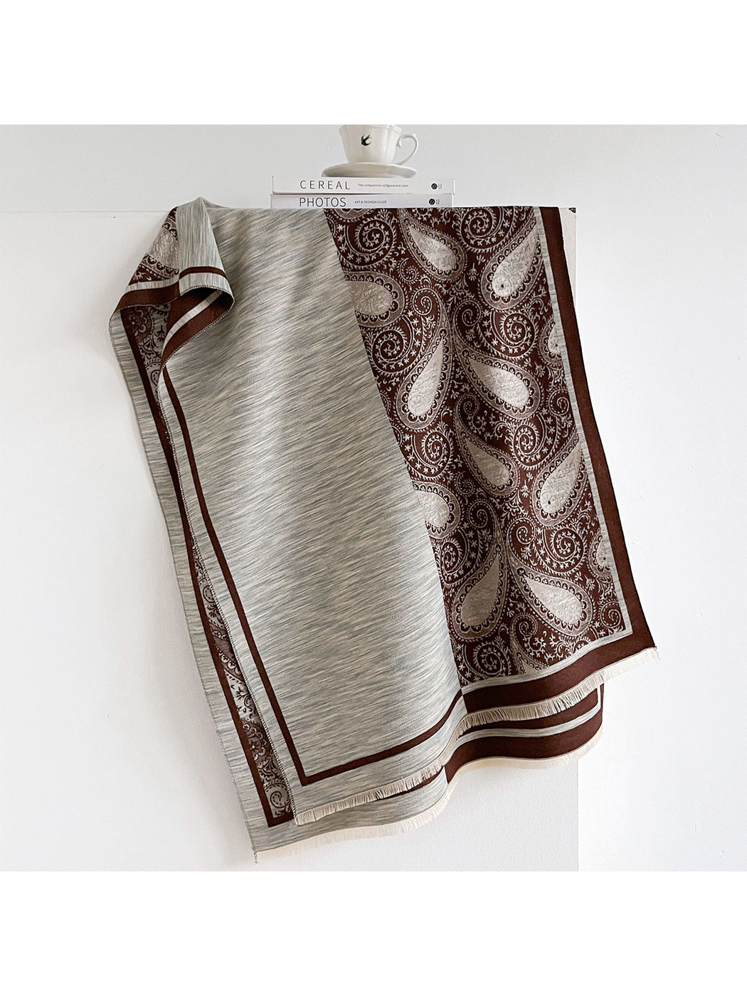 Brown / Gray scarf draped to show its striped section, brown paisley panel and bordered fringed ends.