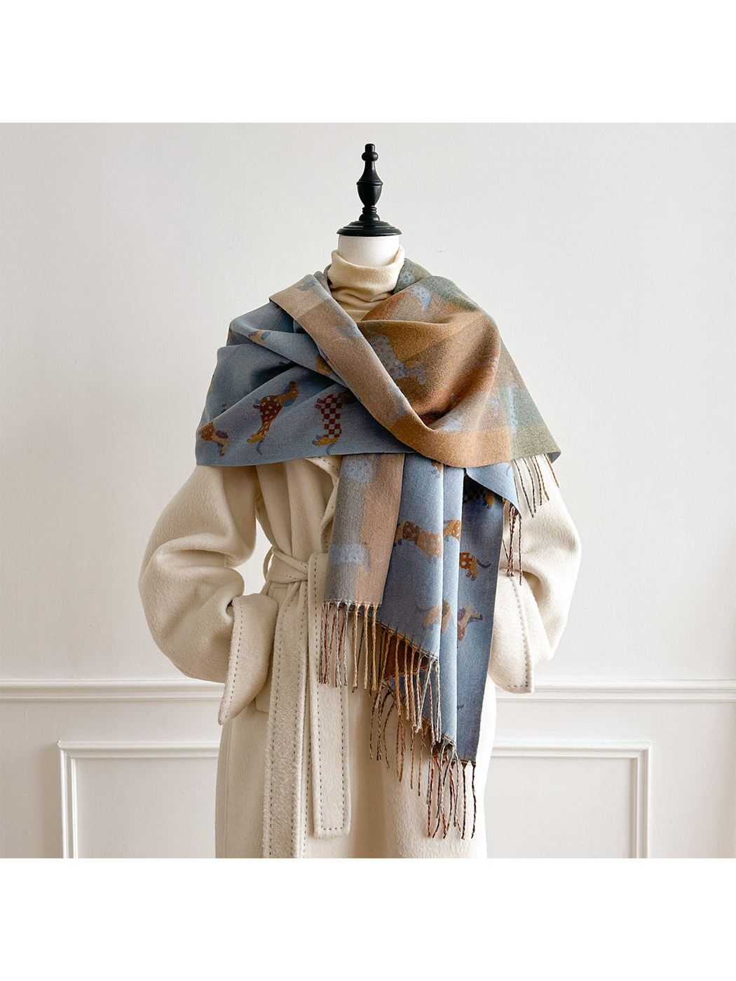 Blue Gray dachshund-pattern scarf wrapped around a mannequin's shoulders, showing its color-block reverse.