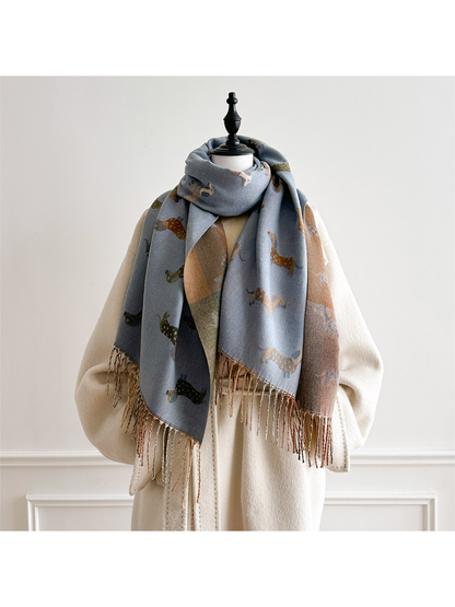 Blue Gray dachshund-pattern scarf looped around a mannequin's neck, with both fringed ends hanging in front.