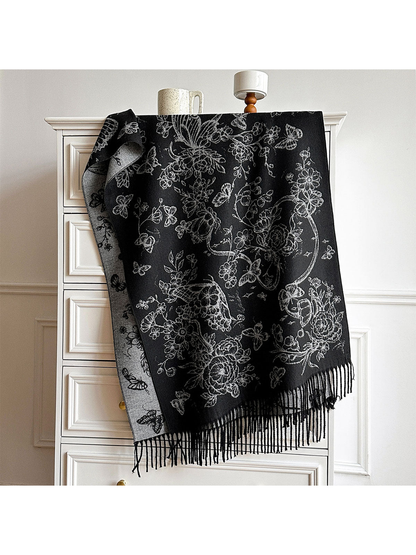 Black Gray floral and butterfly scarf draped over a cabinet, with contrasting reverse and black fringe visible.