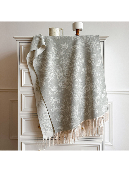 Light Gray floral and butterfly scarf draped over a cabinet, with ivory reverse and fringed ends visible.