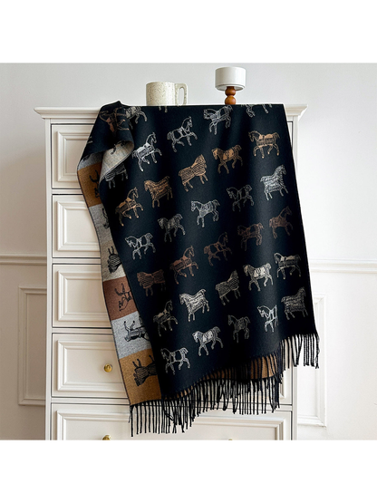 Black horse motif scarf draped over a dresser, with a contrasting color block reverse and long fringe.