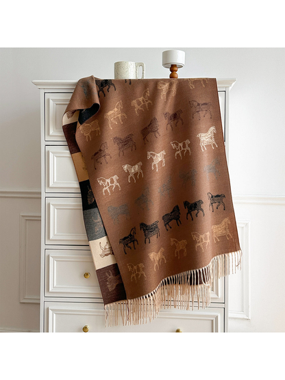 Brown horse motif scarf draped over a dresser, with a contrasting color block reverse and pale fringe.