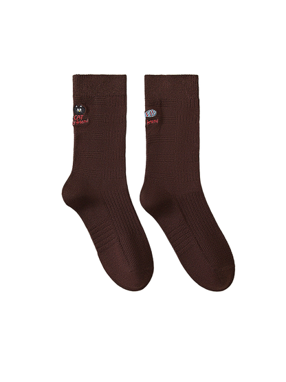 Dark Brown crew socks with cat and fish embroidery and geometric knit texture.