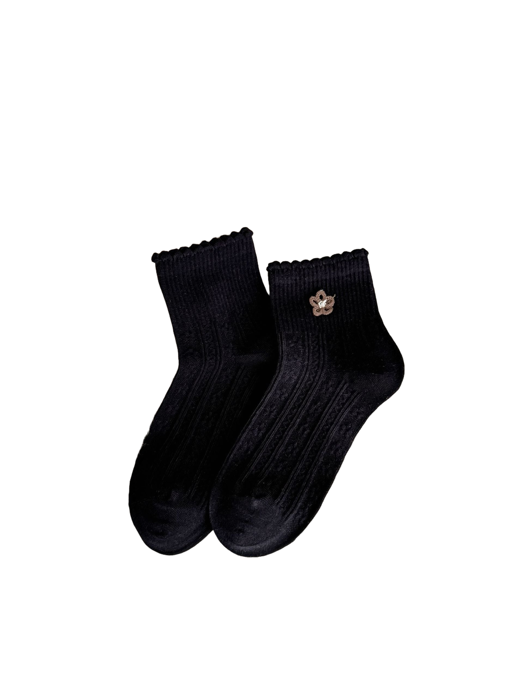 Black socks with brown flower appliqué, ruffled cuffs and vertical textured panels.