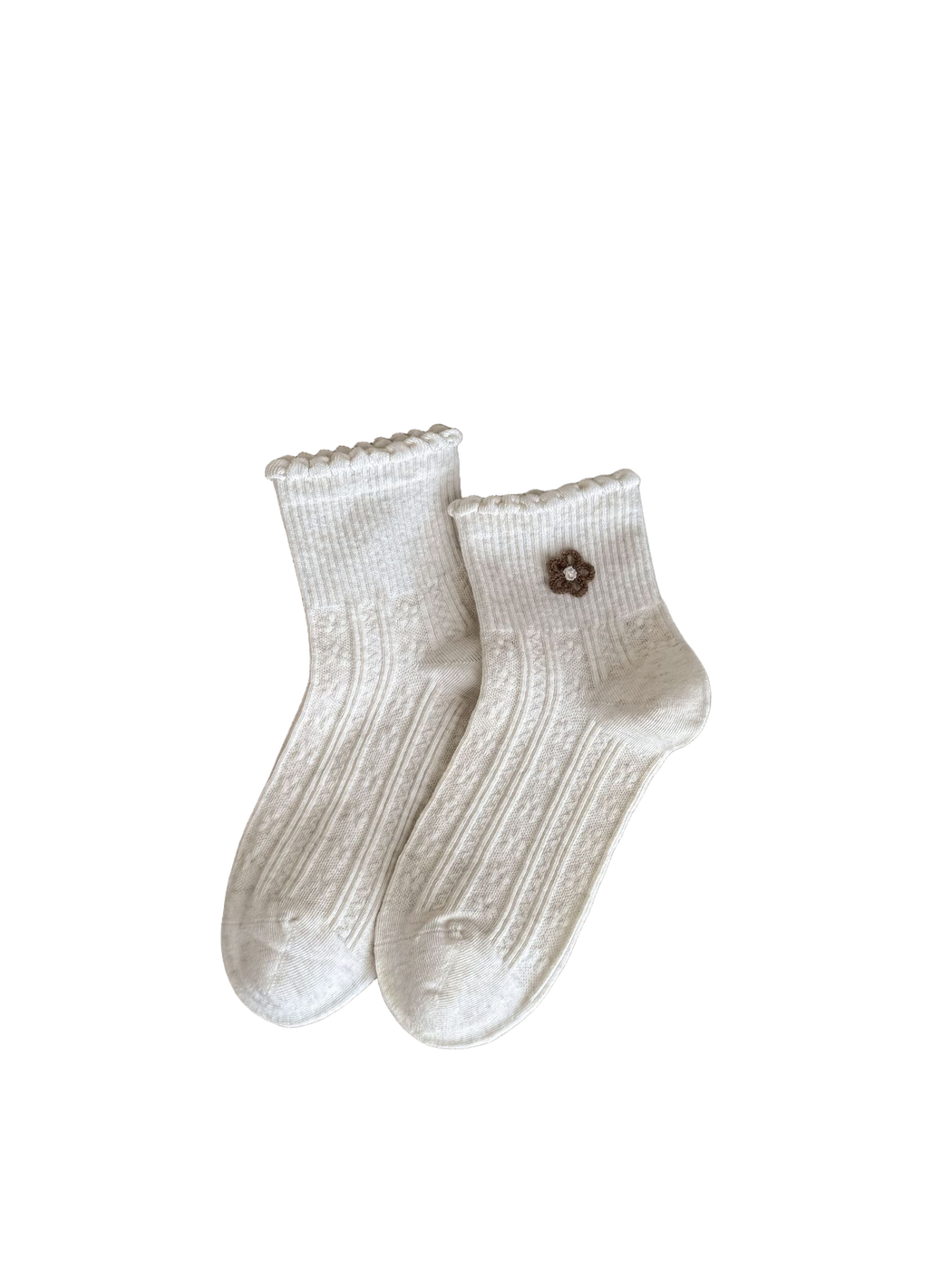 Ivory socks with brown flower appliqué, ruffled cuffs and vertical textured panels.
