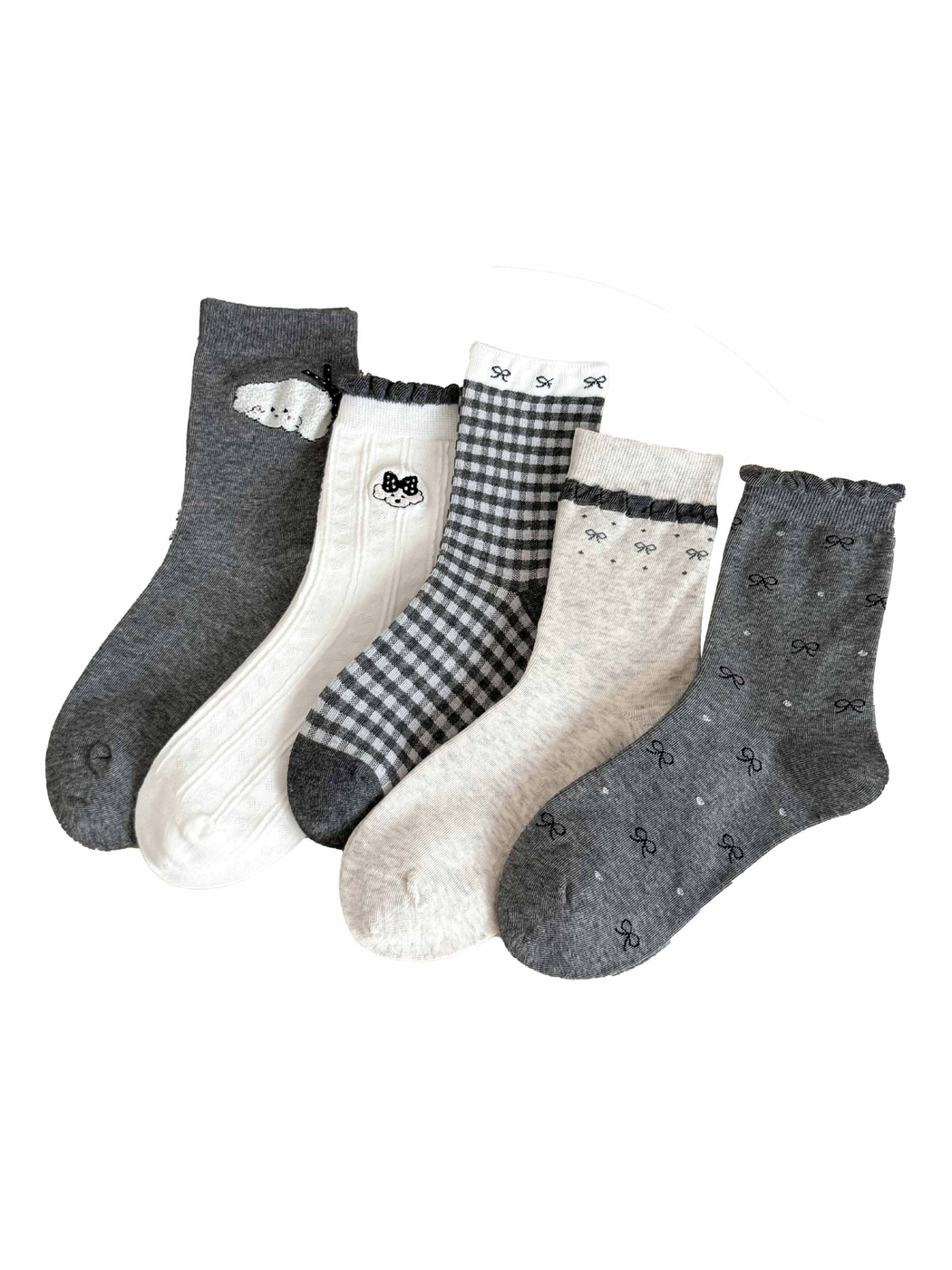 Gray and white crew socks in five styles, with cartoon motifs, gingham, bows and ruffled trim.