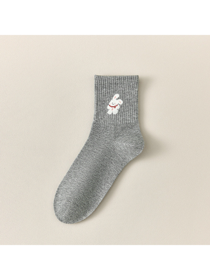 Gray Rabbit crew sock with a ribbed cuff and white rabbit motif.