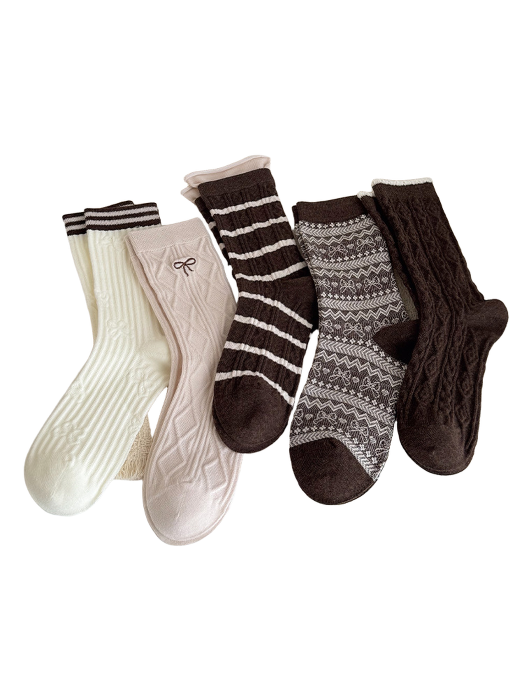 Ivory, beige and brown socks arranged side by side, showing striped, bow, cable, Fair Isle and scalloped-cuff designs.