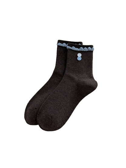 Buttons style crew socks with blue ruffled trim and two button accents on a white background.