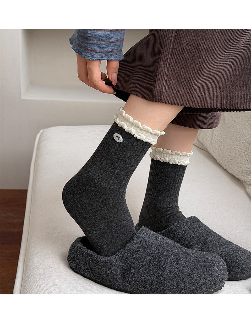 Bow Badge style socks worn with slippers, showing the contrasting double ruffled cuffs.