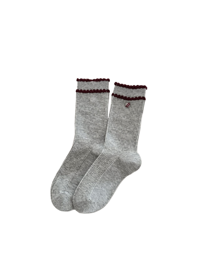 Heather gray Ruffle socks with burgundy cuff trim and a plaid oval accent.