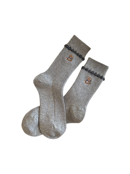 Gray ribbed socks with embroidered bears and dark loop trim on a white background.