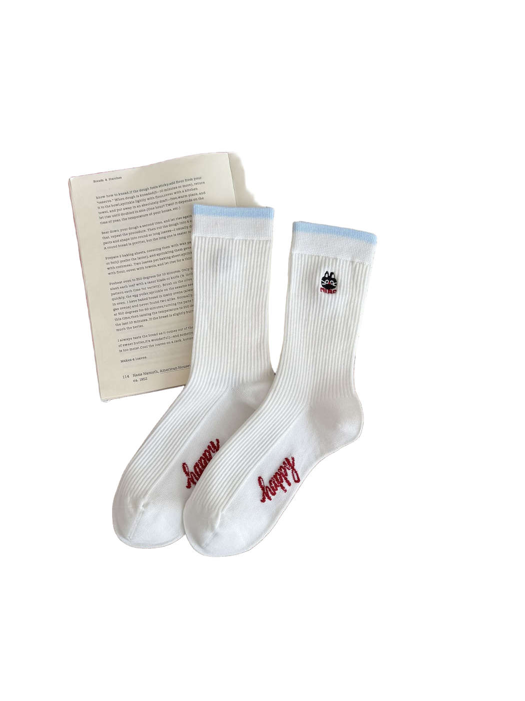Cat socks with white ribbing, light blue cuffs, a cat motif and red foot lettering
