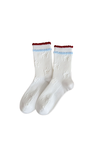 Stars socks with raised white stars and red and light blue ruffled cuff trim