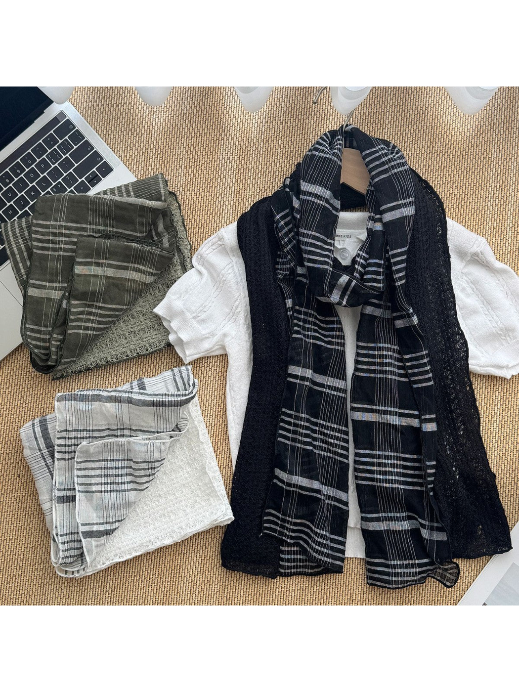 Black Gray, Army Green and White plaid scarves with openwork panels displayed together.