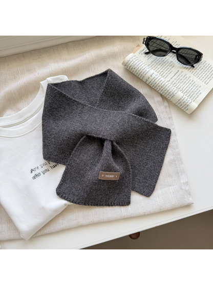 Dark Gray knit pull-through scarf arranged with crossed ends.