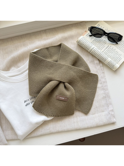 Dark Khaki knit pull-through scarf arranged with crossed ends.