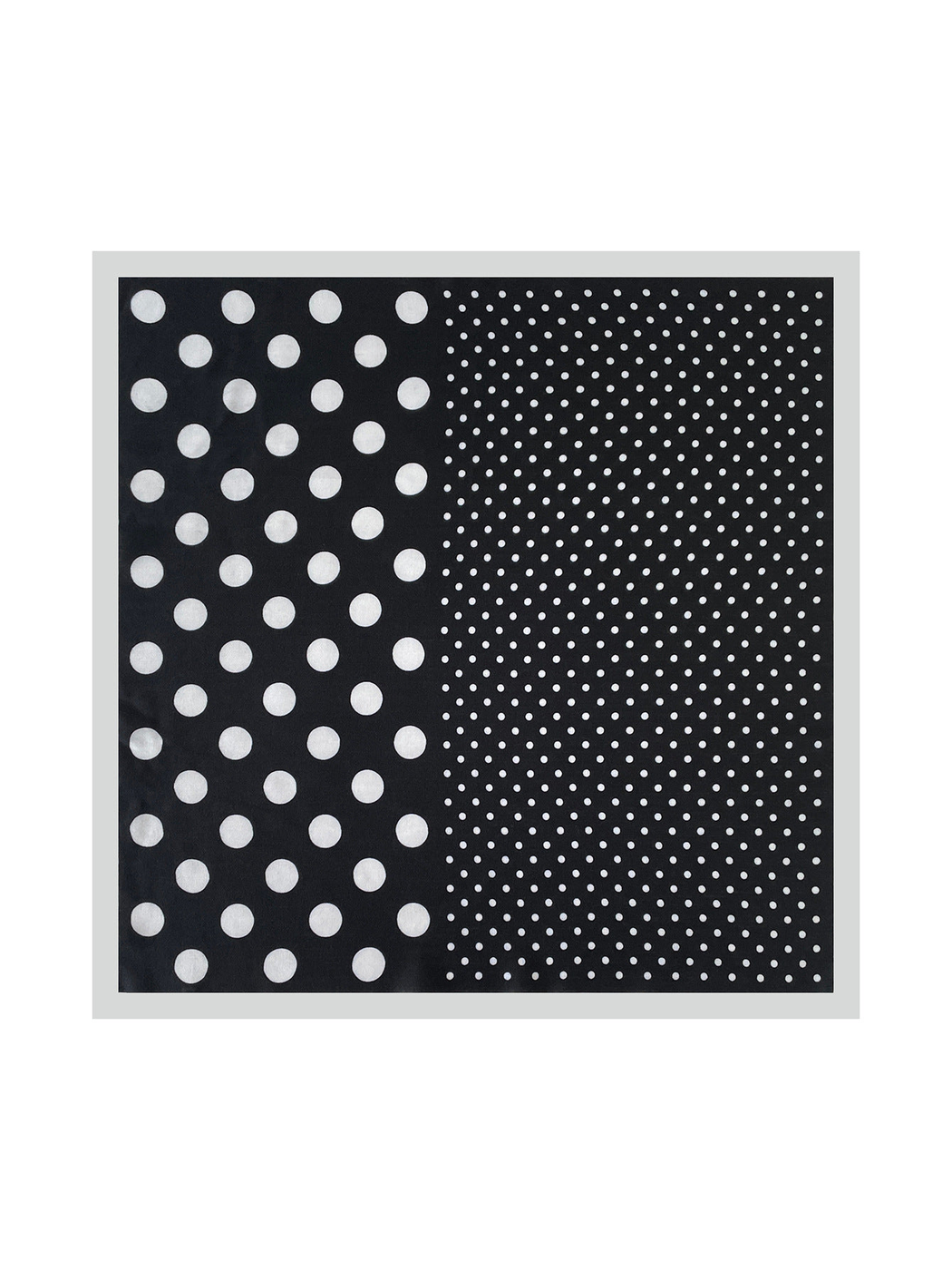 Black square scarf laid flat, with large and small white polka dots and a contrasting pale border.