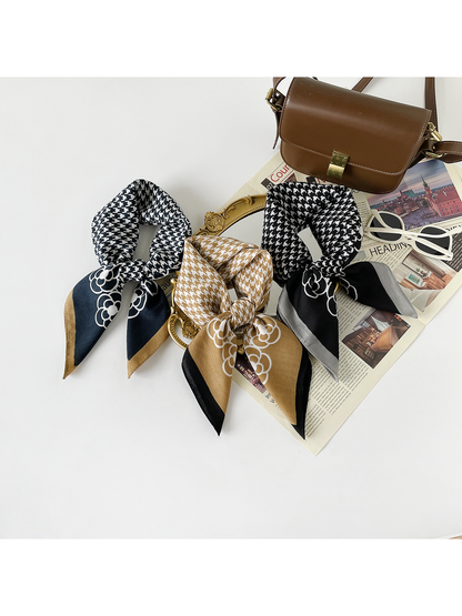 Navy, Camel and Black Gray scarves arranged together in knotted loops.