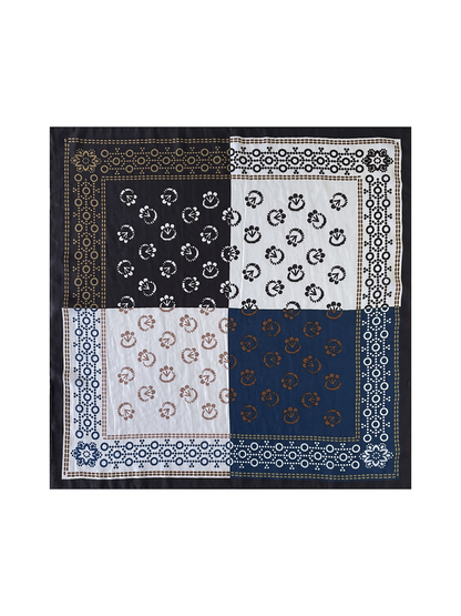 Navy Orange square scarf laid flat with four contrasting panels, floral medallions, and dotted-ring borders.