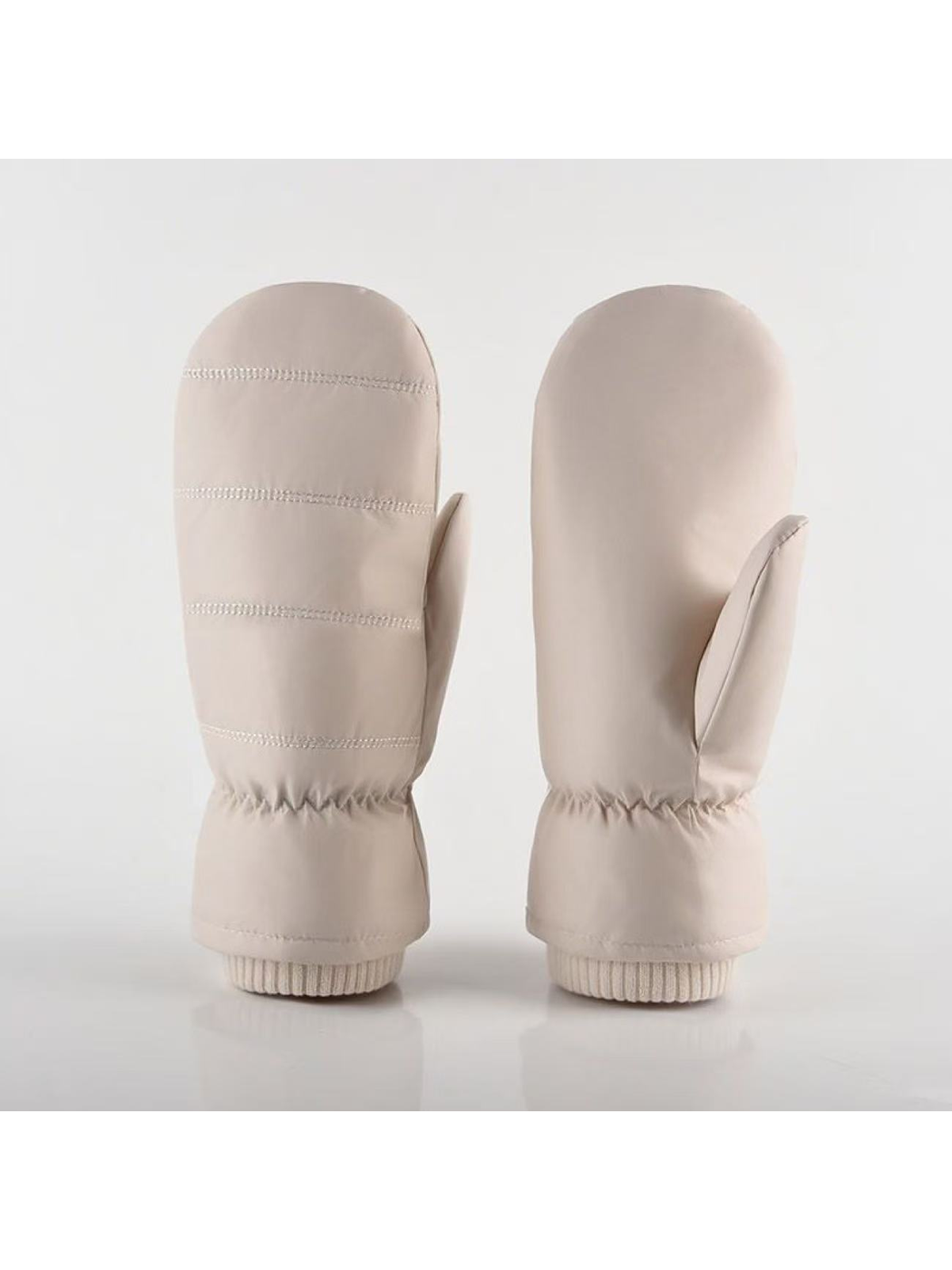 Ivory Channel mittens showing stitched backs and separate thumbs.