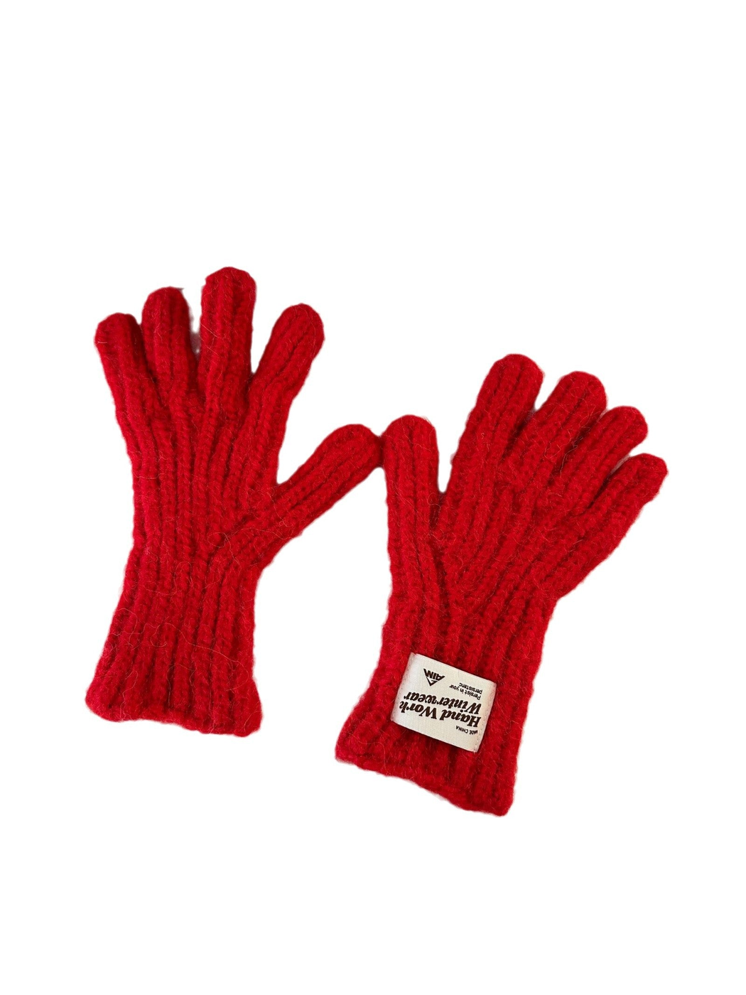 Red ribbed gloves with fuzzy texture displayed on a white background