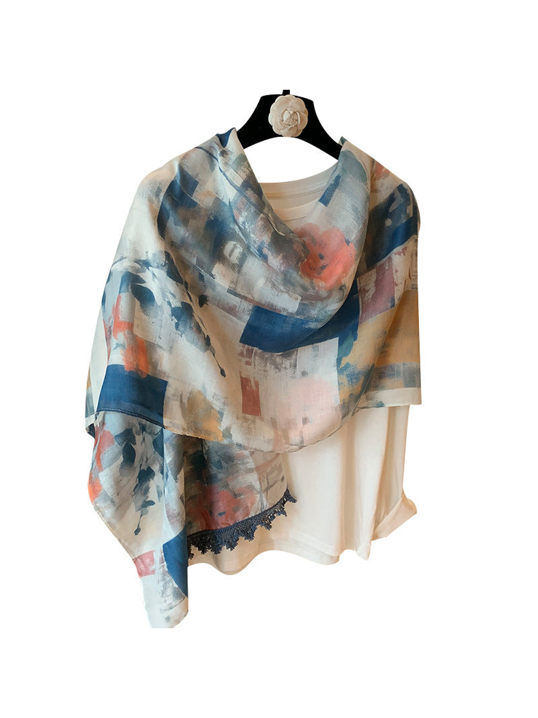 Multicolor abstract color-block scarf with fringe trim, draped front view