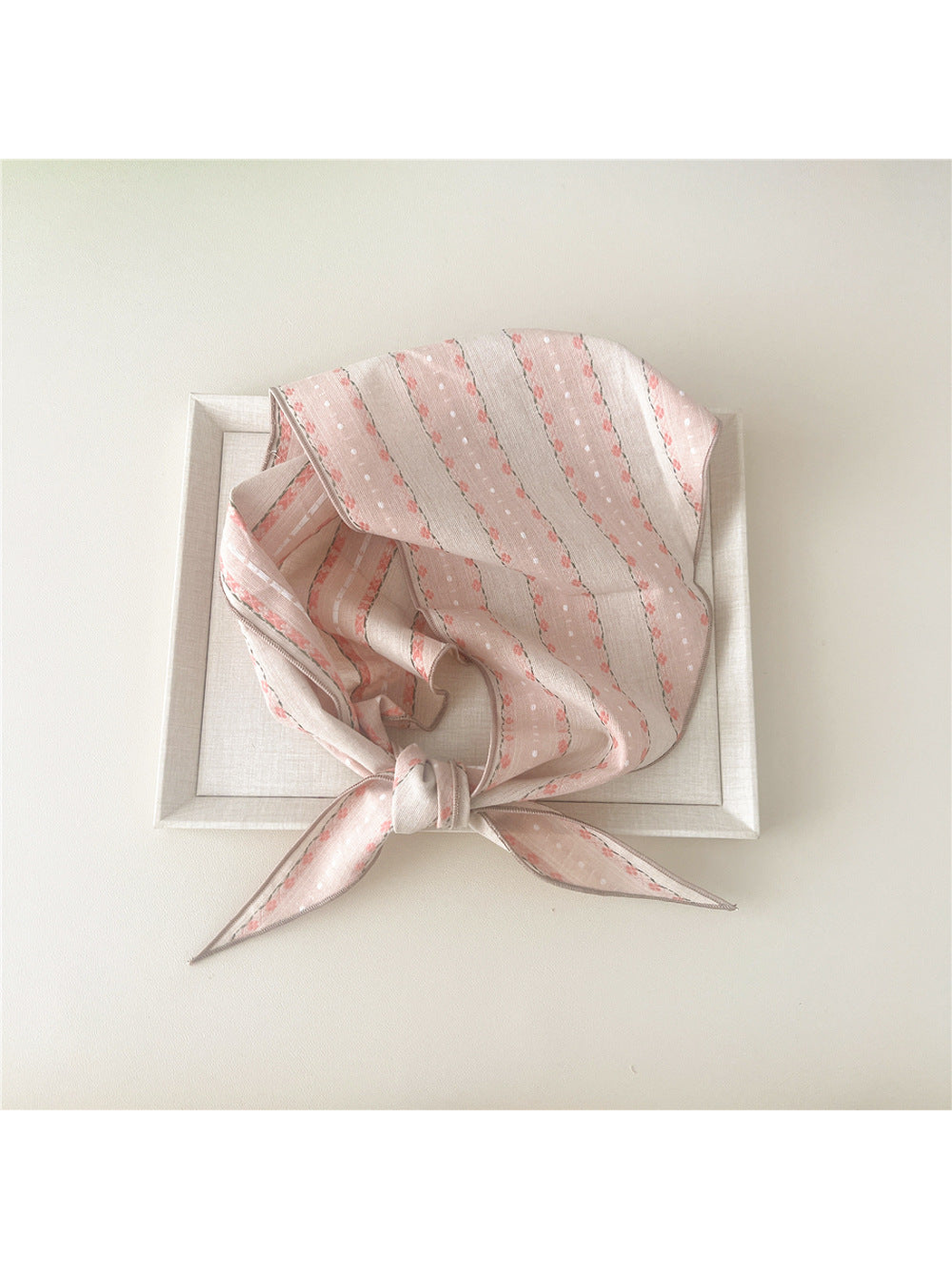 Pink Floral triangle scarf tied in a loop