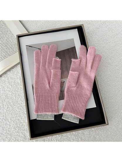 Pink gloves displayed from another angle