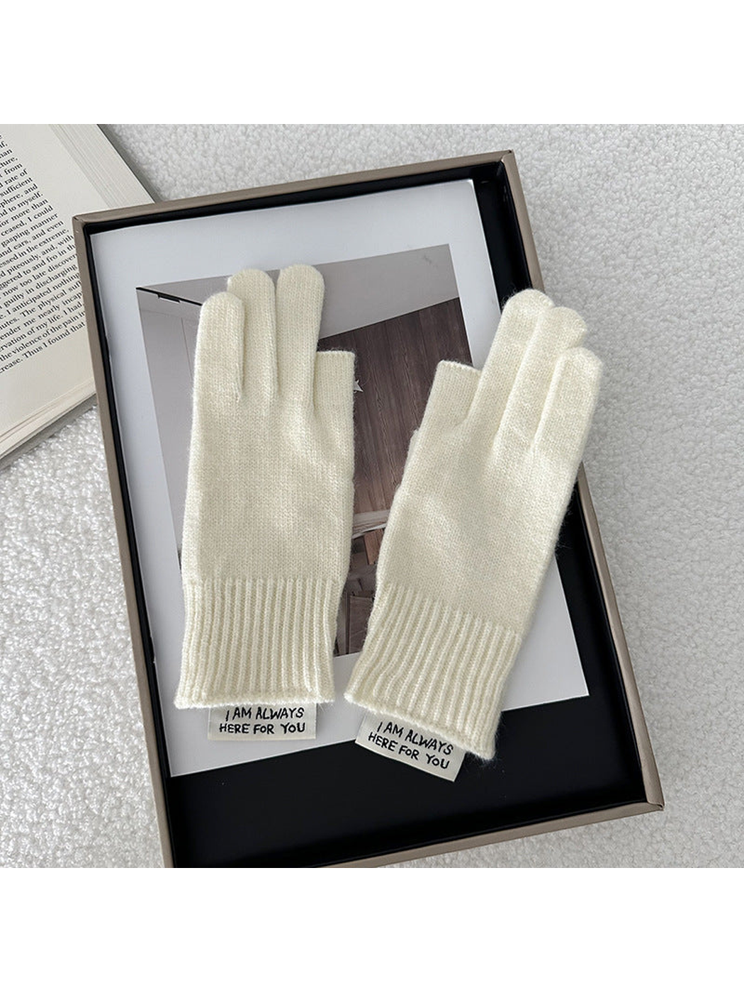 Ivory gloves displayed as a pair