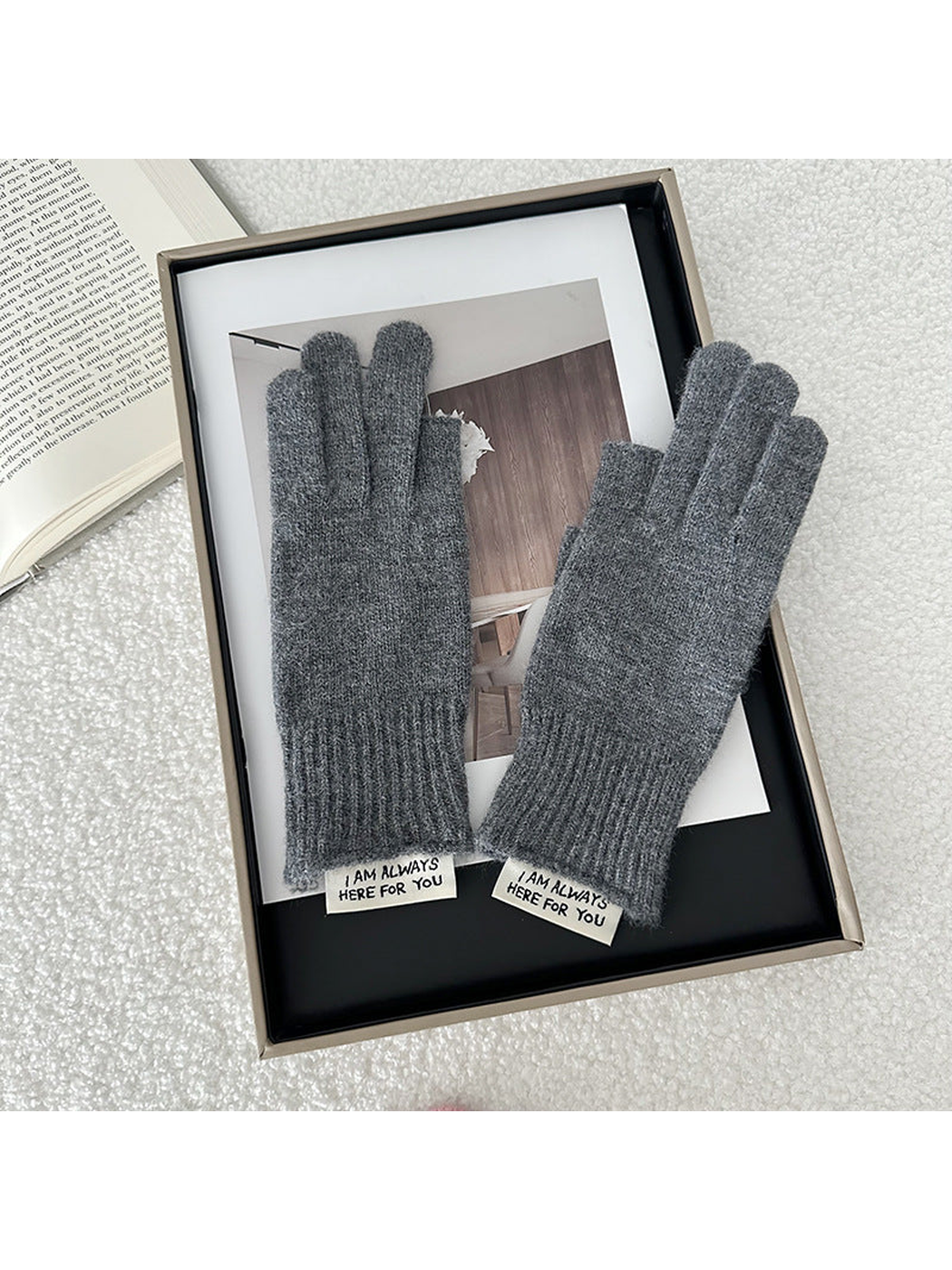 Gray gloves displayed as a pair