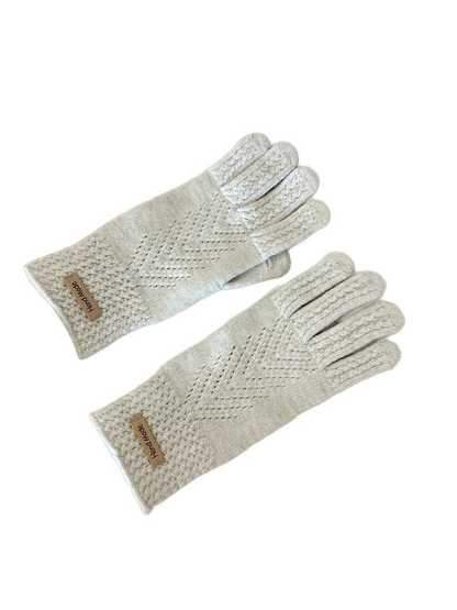Two ivory gloves displayed on a white background