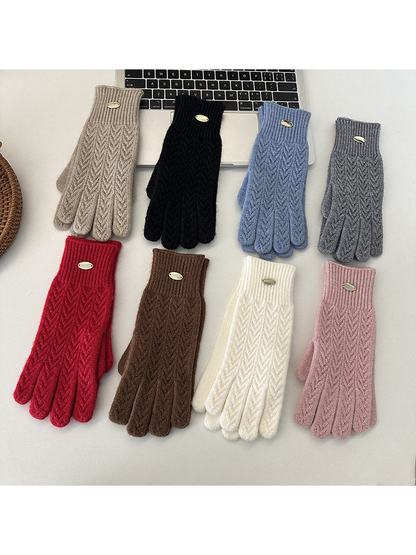Multiple colors of five-finger gloves displayed together