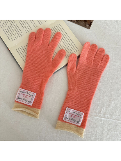 Orange Red gloves with cream ribbed cuffs