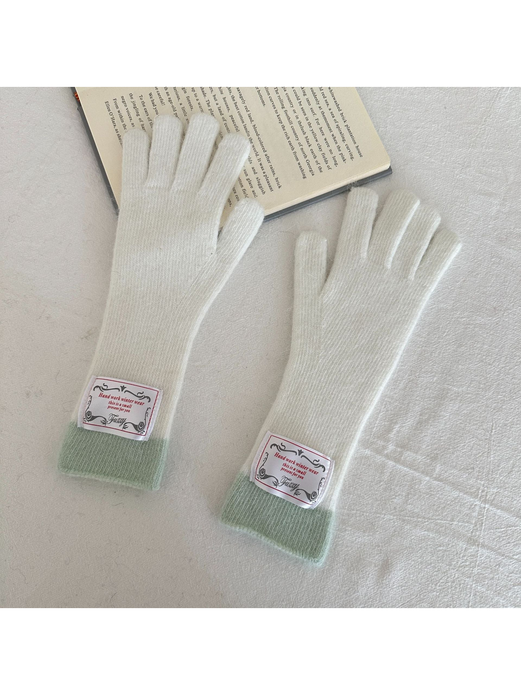 White gloves with pale mint ribbed cuffs