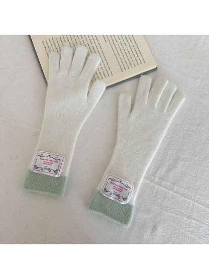 White gloves with pale mint ribbed cuffs