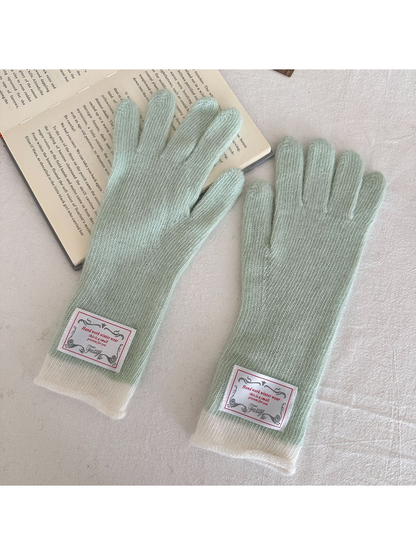 Mint gloves with ivory ribbed cuffs
