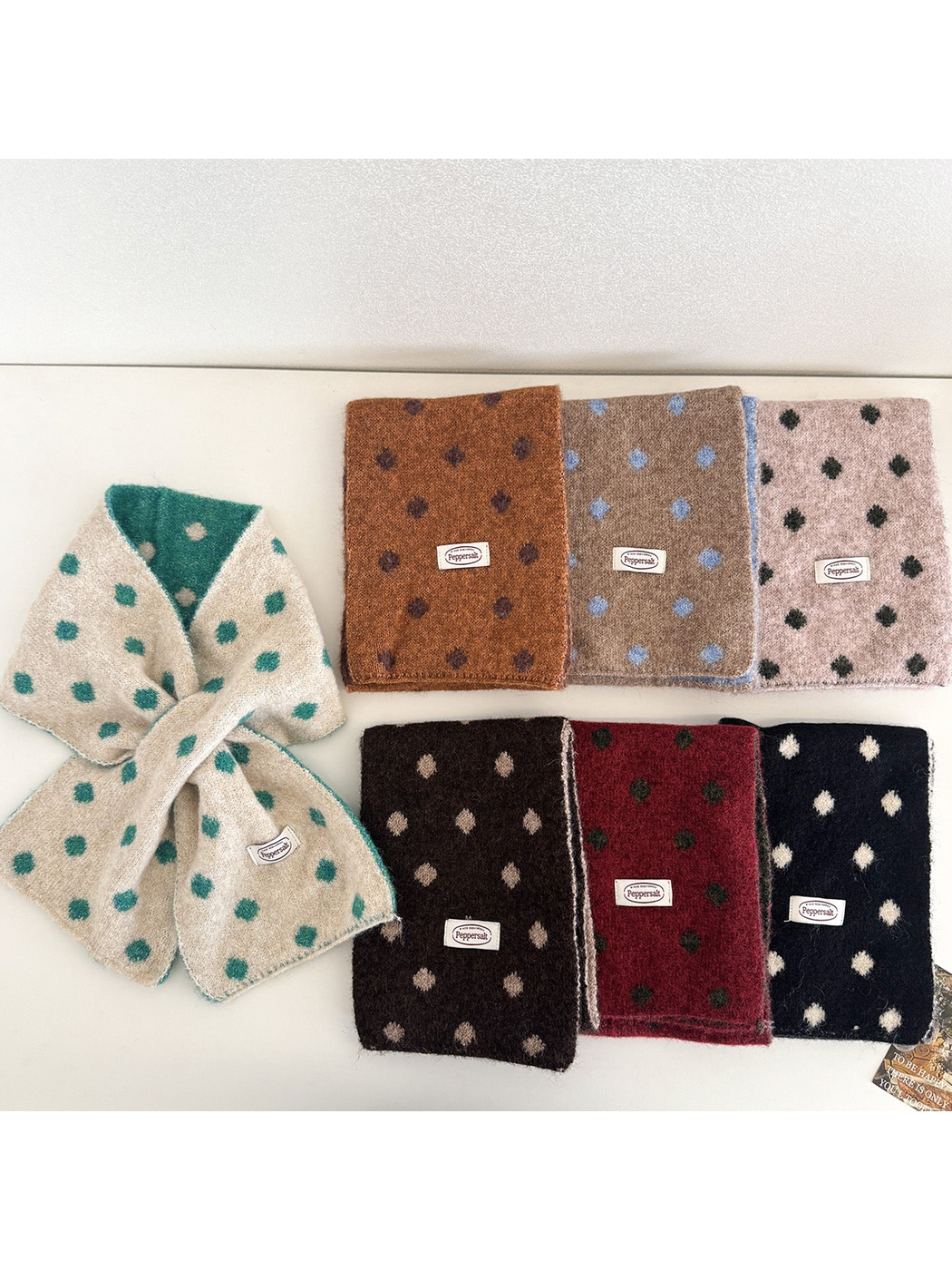 Multiple polka-dot scarf colors displayed together