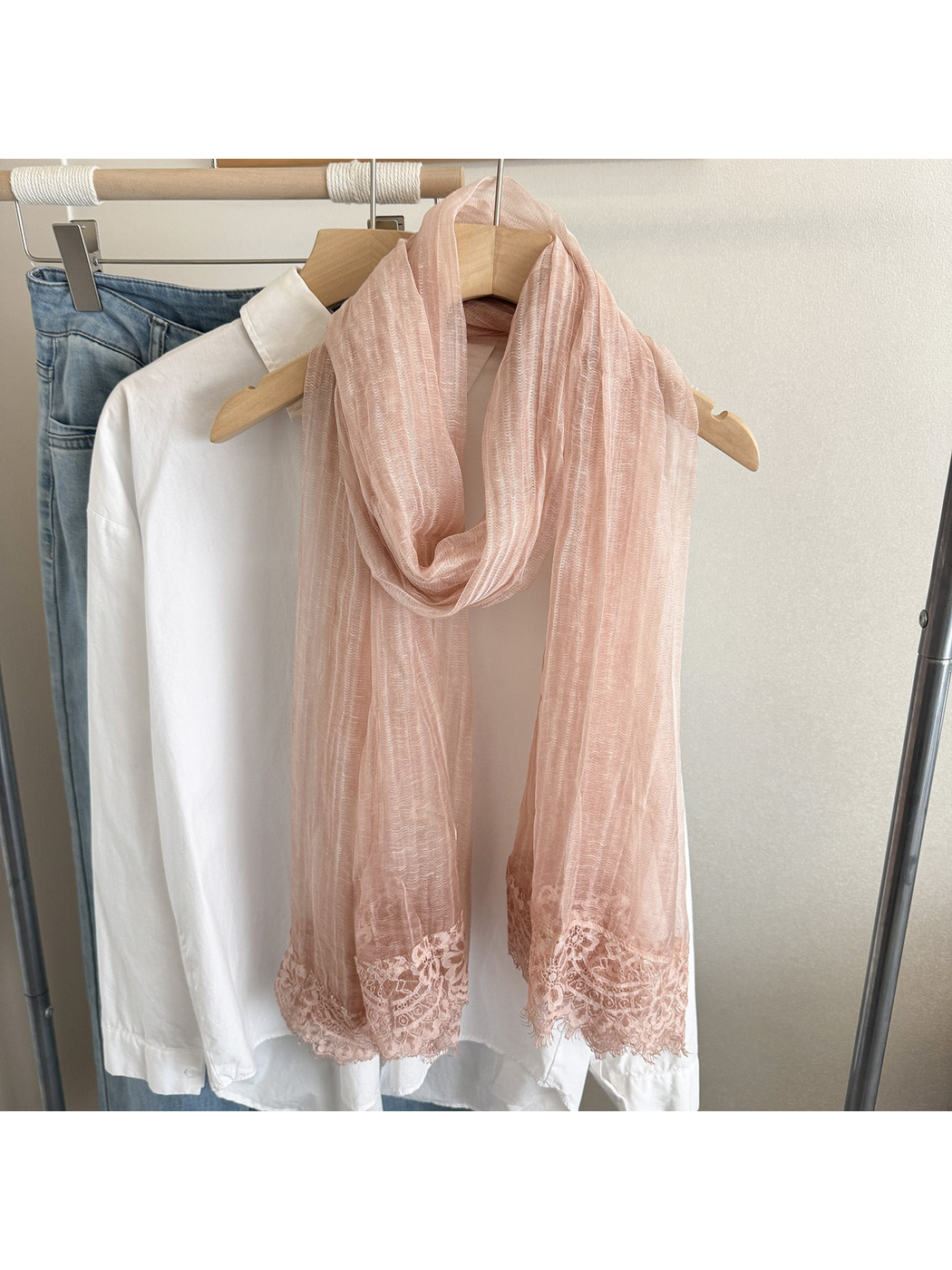 Blush Pink narrow scarf with floral lace trim, looped display