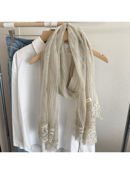 Greige narrow scarf with floral lace trim, hanging display