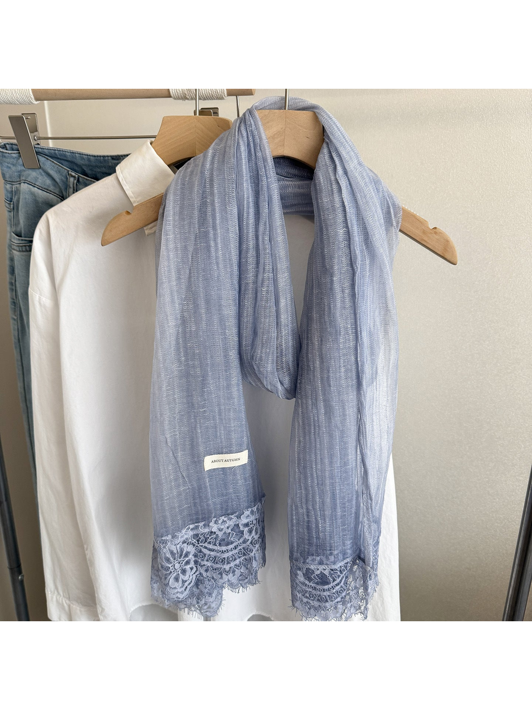Blue Gray narrow scarf with floral lace trim, hanging display