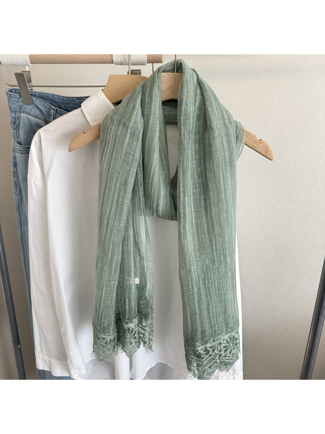 Army Green narrow scarf with floral lace trim, hanging display