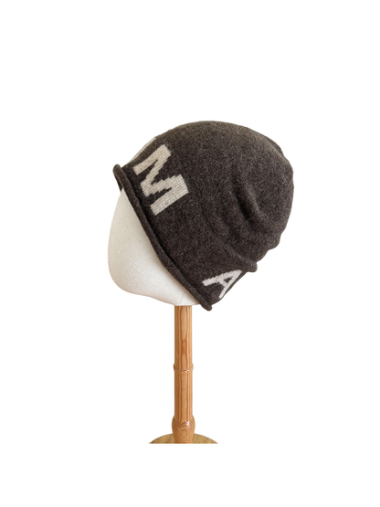 Brown Ivory beanie with a folded cuff and contrasting block lettering
